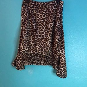 Off the shoulder Cheetah print shirt.